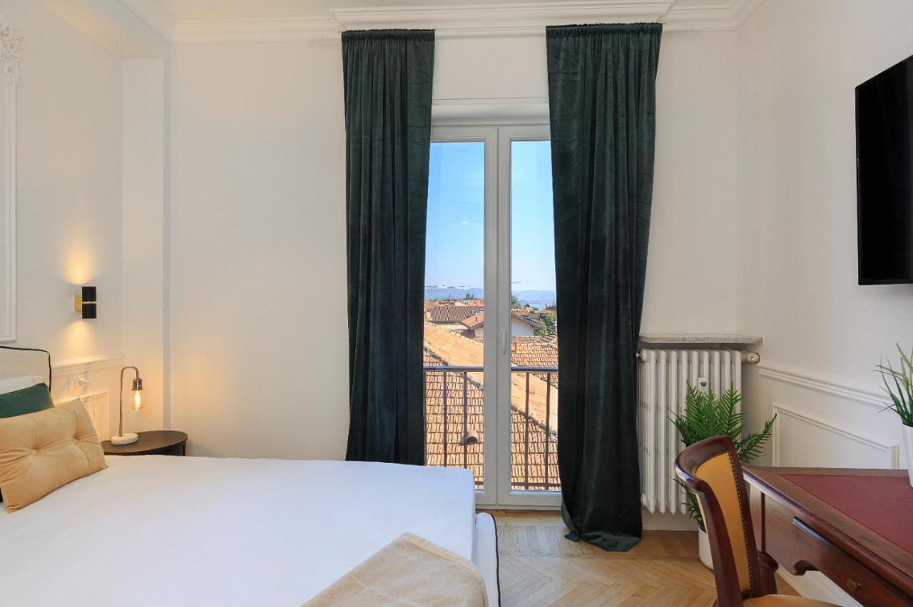 Apartamento Iris Appartement Lesa Buitenkant foto